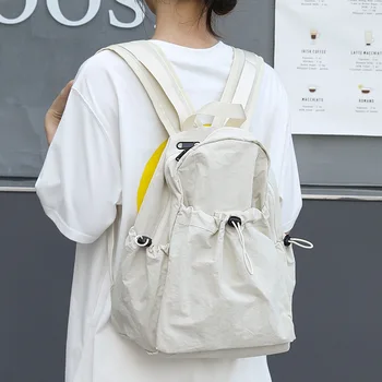 Повседневный рюкзак 2023 года, новая крупнотоннажная плиссированная нейлоновая сумка на шнурке, минималистичная легкая студенческая сумка через плечо, тренд, универсальная модель